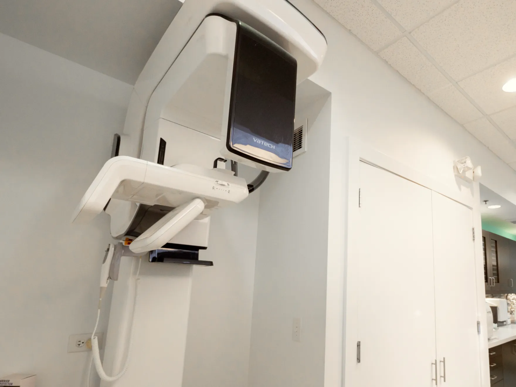 a hospital room with a monitor and medical equipment
